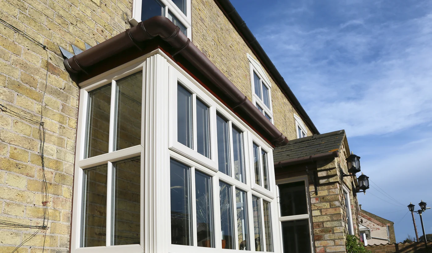 Bow and bay window on a stone house